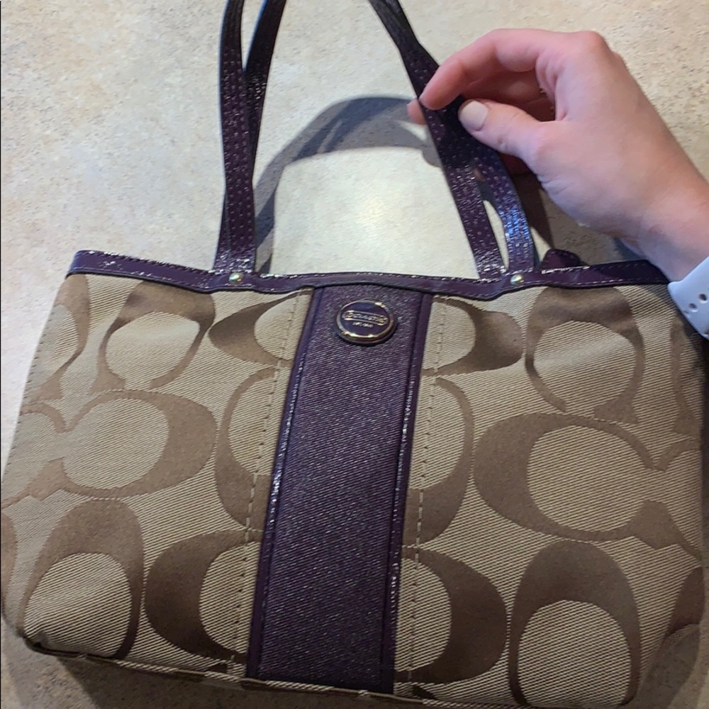 Tan and purple coach purse